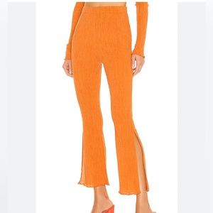 Camila Coelho linez pant in sunset orange